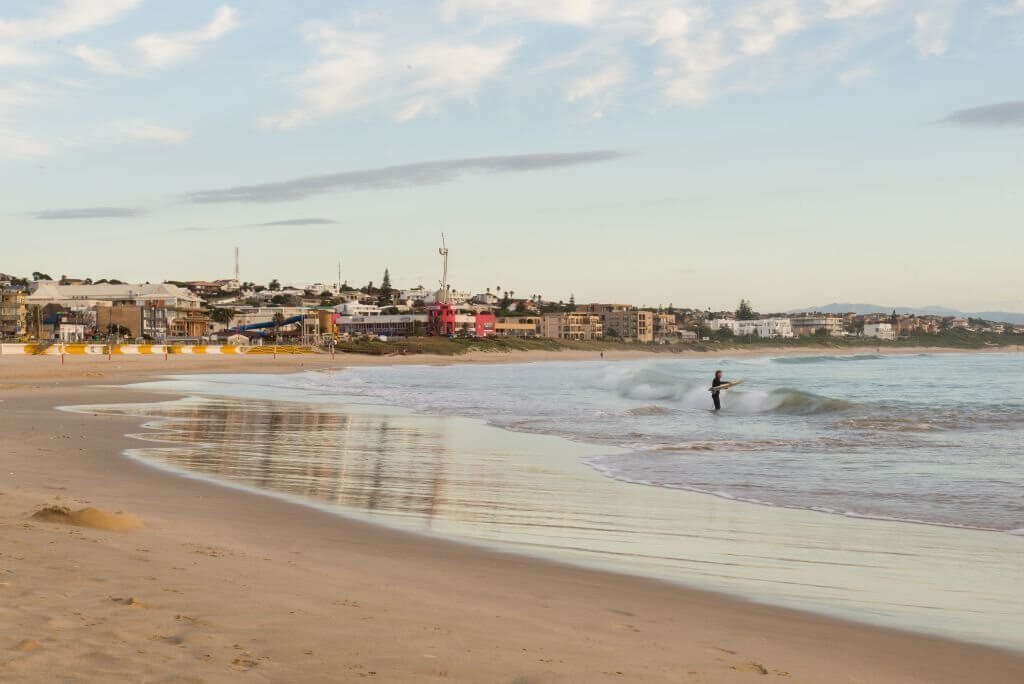 Life Coaching - Surfer entering ocean