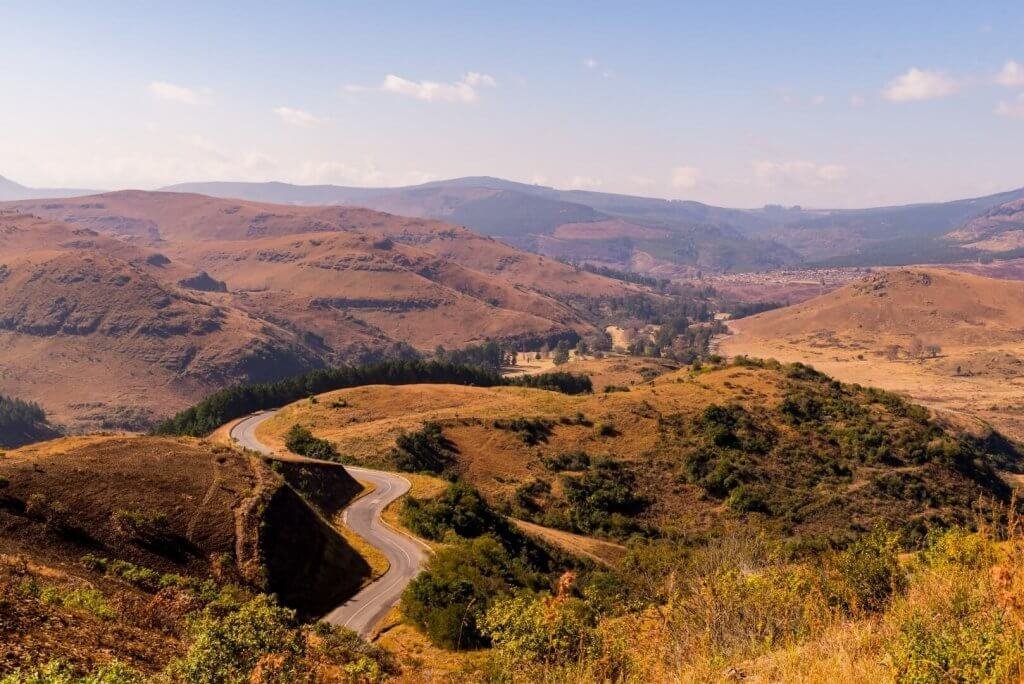 Tar road winding through the hills